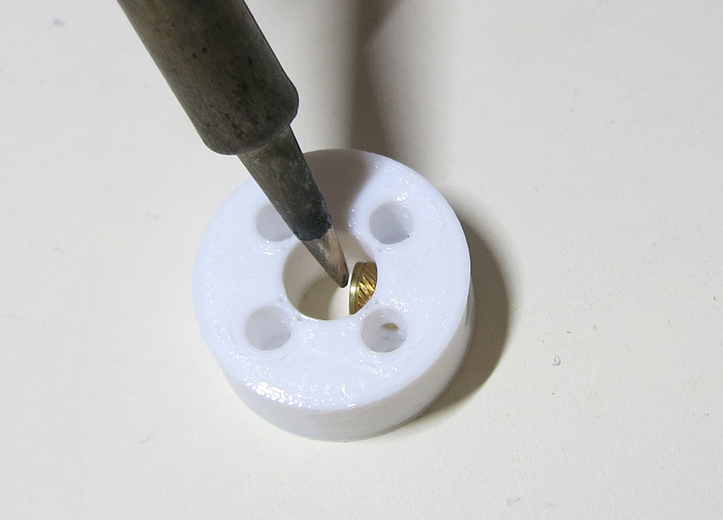 Servo coupler heat insert finishing